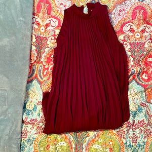 A maroon strapless dress by Est. 1946 in size large